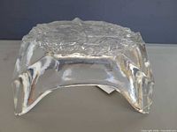 Side profile of square clear glass bowl showing thickness and transparency