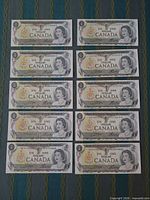 All ten $1 notes laid out for full view