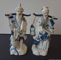 Front view of both porcelain figurines