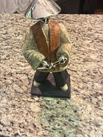 Front view of resin figurine on base