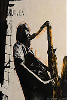 Front view of canvas showing full saxophone player design