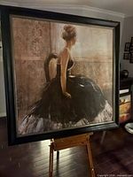 Front view of framed canvas artwork on easel