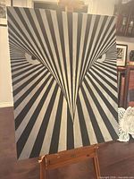 Front view of the painting on easel