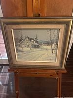 Framed winter landscape painting front view