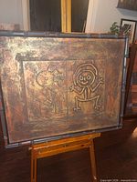 Front view of framed textured painting