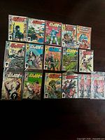 15 bagged G.I. Joe Marvel comics laid out on floor