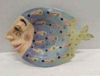 Front view of the sculptural fish bowl showing full design and shape