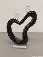 Front view of Murano glass lovers sculpture on base