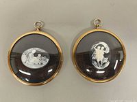 Front view of both framed cameo plaques