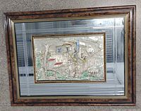 full view of framed 3D relief artwork