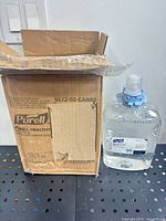 Box and one refill cartridge visible