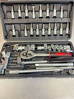 Open case showing full 46-piece socket and bit set