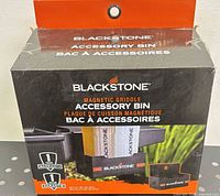 Front view of unopened Blackstone magnetic accessory bin retail box