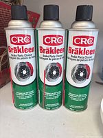 Front view of three CRC Brakleen cans