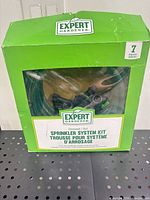 Front of Expert Gardener sprinkler system kit box showing product name and contents