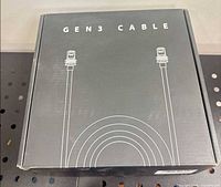 Front of black retail box marked “GEN3 CABLE” with line art of the cable and connectors