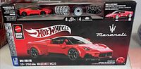 Front of Hot Wheels Brick Shop Maserati MC20 set box showing die-cast car and rims