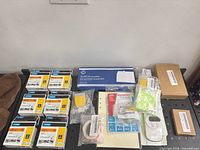 Overview of entire lot showing all boxed and packaged items
