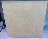Sealed cardboard box containing lazy Susan