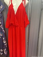 Full view of red dress front on mannequin