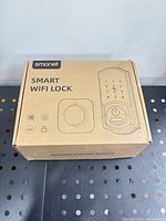 Closed retail box showing Smonet Smart WiFi Lock branding