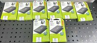 Eight boxed Trodat 9052 stamp pads on perforated metal surface