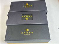 Three Cross branded presentation boxes showing packaging