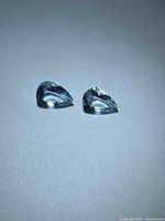 Pair of pear-cut aquamarines front view