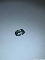 Front view of oval blue tourmaline
