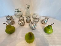 Group shot of all glass, ceramic and wooden fruit