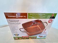 Front of sealed Copper Chef XL casserole pan retail box