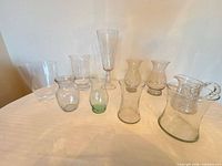 Group shot of all ten vases and candle holders
