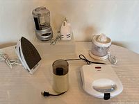 Group shot of all six small appliances with cords visible