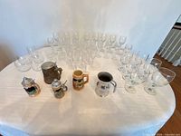 Overview of all glassware and steins on table