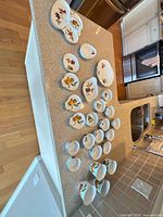 Overview of entire 25-piece set laid out on countertop