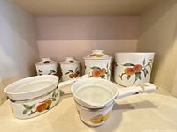 Group image showing seven Royal Worcester kitchen pieces