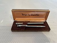 Open presentation case displaying fountain pen and ballpoint