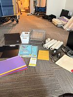 All items laid out including desk organizer, pads, folders, rolls, accessories