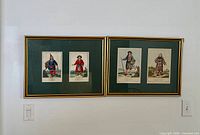 Both framed engravings side by side on wall