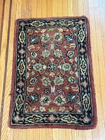 Full view of small hand-knotted rug