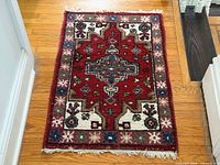 Full view of the Persian Asadabad wool rug showing overall design and size