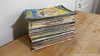 Side view of stacked Mad magazines showing thickness and spines