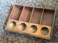 Top view showing full layout of compartments and coin wells