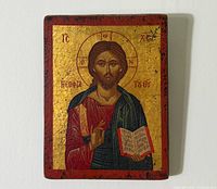 Front view of gilded wood icon showing full artwork