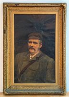Full view of framed oil portrait showing subject and frame detail