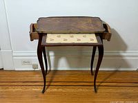 Front view with pull-out tray extended showing floral insert