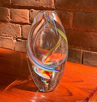 Front view of clear glass vase showing full ribbon swirl pattern