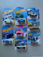 Front view of the eight Hot Wheels blister-card vehicles