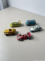 Group shot of all five die-cast vehicles