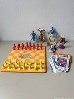 Group shot of chess set, card deck and assorted toys